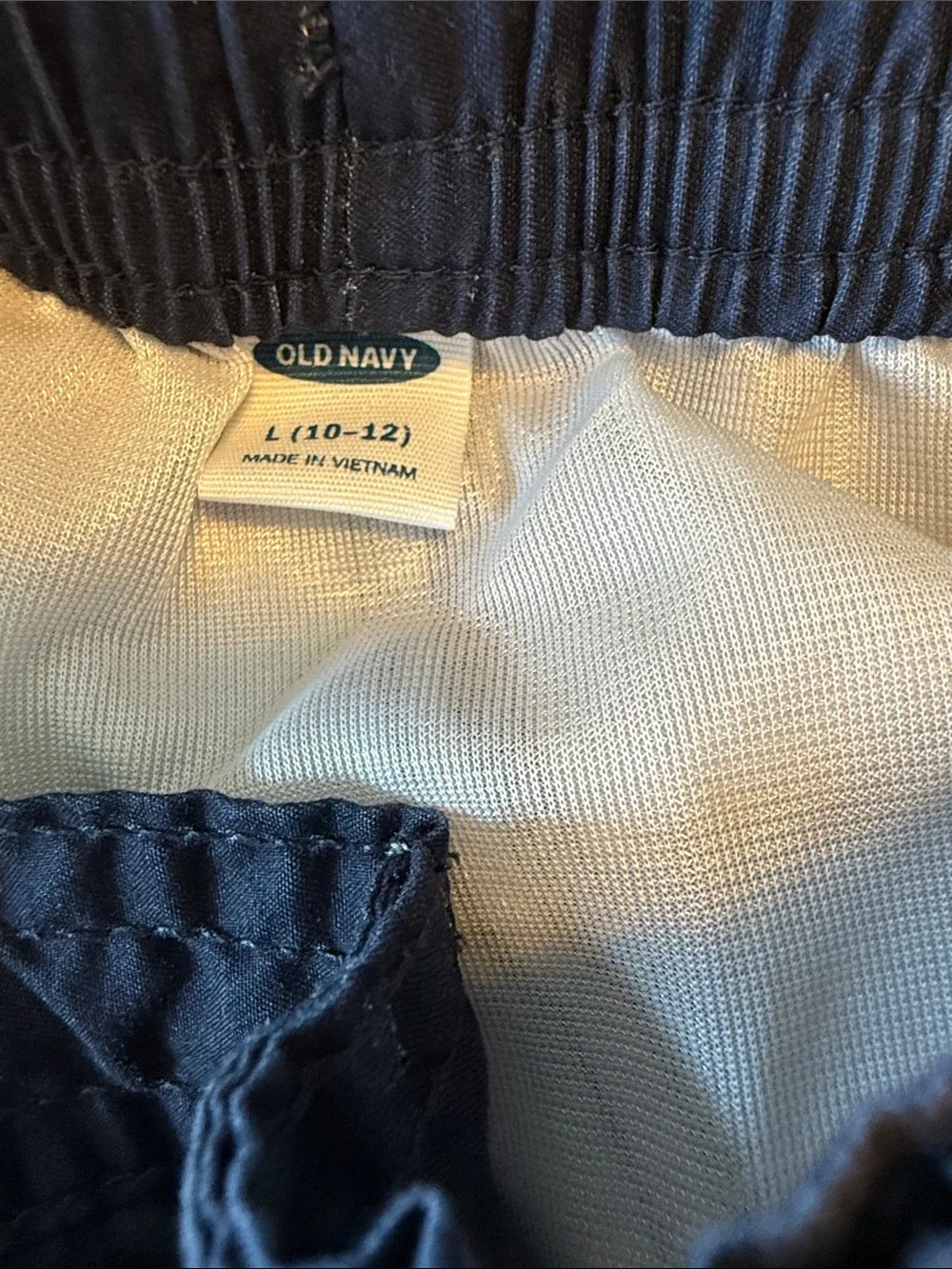 Old Navy Navy Swim Trunks with Red and Orange Stripes